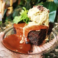 Brownie with pistache ice-cream. Amazing... at Eqvilibrivm Cafe in Barcelona