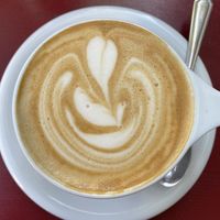 Latte with oat milk at Eqvilibrivm Cafe in Barcelona