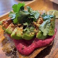 Avocado-beetroot hummus bread  at Eqvilibrivm Cafe in Barcelona