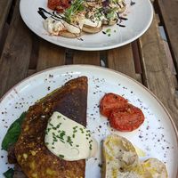 (Top) cream cheese pancakes. (Bottom) tofu omelette at Eqvilibrivm Cafe in Barcelona