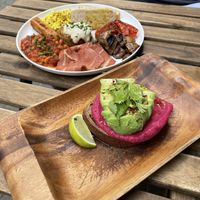 Vegan full English breakfast and avocado toast  at Eqvilibrivm Cafe in Barcelona