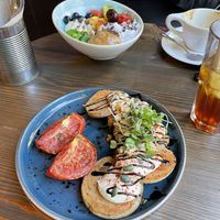 Savory pancakes and a chia/açaí bowl  at Eqvilibrivm Cafe in Barcelona