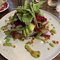 Avo toast with black bean hummus  at Eqvilibrivm Cafe in Barcelona