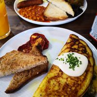 English breakfast and chickpea omelet at Eqvilibrivm Cafe in Barcelona