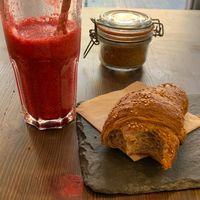 Spelt croissant and freshly pressed juice🤩 at Eqvilibrivm Cafe in Barcelona