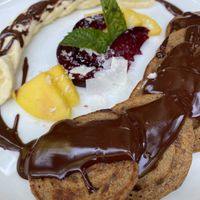 Banana and chocolate pancakes  at Eqvilibrivm Cafe in Barcelona