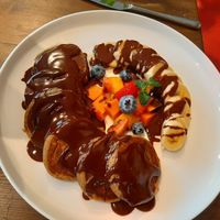 Buckwheat pancakes with chocolate and banana at Eqvilibrivm Cafe in Barcelona