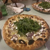 Pizza Teresina - 3 cheese pizza (v), rocket, red onion at Pisco in Vila Do Bispo