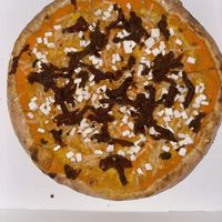 Pumpkin Pizza with vegan feta cheese and dried tomato's  at Pisco in Vila Do Bispo