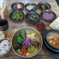 Bibimbap, stew and side dishes at Babiboyak in Jeju