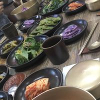 Full table of banchan  at Babiboyak in Jeju