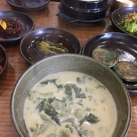 Perilla seed sujebi in the front, soft tofu soup in the back at Babiboyak in Jeju