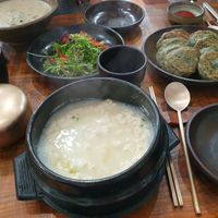 Tofu stew with side dishes at Babiboyak in Jeju