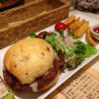 delicious tofu burger with wedges at Mumokuteki Vegan Cafe in Kyoto