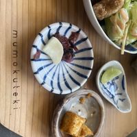 Pickle/ spiced pumpkin and a sliced grape!!  at Mumokuteki Vegan Cafe in Kyoto