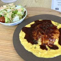 Omurice and salad  at Mumokuteki Vegan Cafe in Kyoto