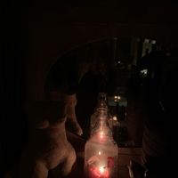 Upstairs area is just lit by candles!  at Café de Loge in Ghent