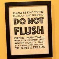 Funny bathroom sign  at Lovebirds Donuts in Kittery