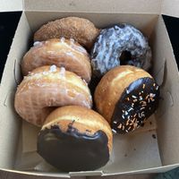 cinnamon sugar, chocolate glazed, chocolate ganache, glazed brioche and boston cream!  at Lovebirds Donuts in Kittery