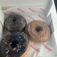 Chocolate glaze, raised w chocolate glaze, apple cider   at Lovebirds Donuts in Kittery