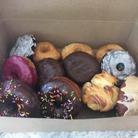 All so good! Glazed choc, old fashioned, blueberry, Boston creme, choc ganache, monkey muffin, dirty chai. Had to go back for glazed brioche and they had the blueberry fritter!!  at Lovebirds Donuts in Kittery