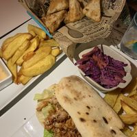 jackfruit nuggets, bbq jackfruit pitta, coleslaw, and fries  at Oceana Club in Benissa