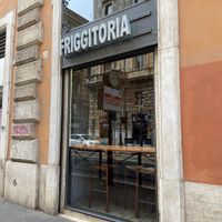 Name outside   at Pizza Time in Rome