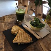 Toast with vegan cheese and rucola and a side salad. at PLANT SHACK - Altea in Altea