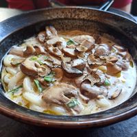Udon noodles with mushrooms and truffle at PLANTA Queen in Toronto