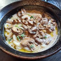 Udon noodles with mushrooms and truffle at PLANTA Queen in Toronto