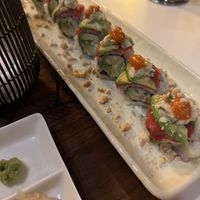 I think this is the dragon or rainbow roll 🍣   at PLANTA Queen in Toronto