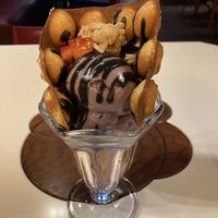 Bubble waffle, Taro ice cream rice crisps & black sessme caramel 😋  at PLANTA Queen in Toronto