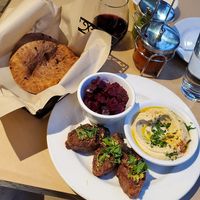 Plant-based lamb with hummus, beet salad, and pita at Oren's Hummus in San Francisco