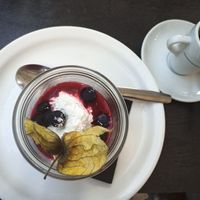 Dessert of cold berry puree complemented by coconut cream and espresso at Daily Gourmand in Vannes