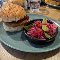 Vegan burger (potato patty topped with a kidney bean and beetroot crush and guacamole). Lightly pickled vegetables/slaw was very good at Daily Gourmand in Vannes