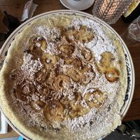 Apple, banana, raisin, powdered sugar, and cinnamon 15"+ pancake   at Oudt Leyden in Leiden