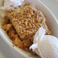 Warm pear apple crisp with coconut ice cream at Slice of Life in Sebastopol