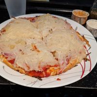 Pizza with onions and ranch dressing at Eden Vegan Cafe in Scranton