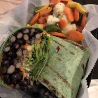 Black bean and avocado wrap with side veggies. HUGE portion, delicious too! at Eden Vegan Cafe in Scranton
