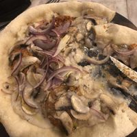 Cheese on the pizza was pretty watery. at Amami Garden in Ungasan