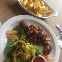 Buffalo cauliflower wings and chips. at The Smithfield Bell in Welshpool