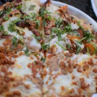 Half mexicana half al pastor at esTACOmo quiere in Puebla