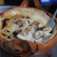 Queso fundido at esTACOmo quiere in Puebla