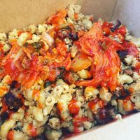 Smoky Mac n cheese with crispy tofu bits and kimchi. I added siracha!  at Animal Liberation Kitchen in Toronto
