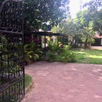 From the entrance gate, gorgeous relaxing garden  at Roots Cafe in Siem Reap