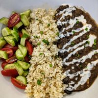 BB Bowl - stewed black beans + brown rice + tomato and cucumber salad at Roots Cafe in Siem Reap