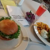 Classic burger (left) and Burger menu (right) plus optional Cole slaw (middle) and homemade lemonade (top). at Eaternia in Prague