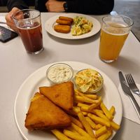 Smažák (fried cheese) with french fries and cornpatty with potato salad. at Eaternia in Prague