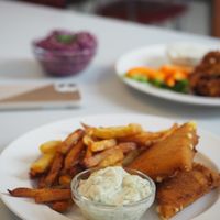 Fried cheese with fries and sour cream at Eaternia in Prague