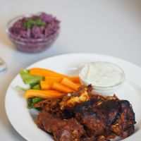 Vegan buffalo wings made of cauliflower at Eaternia in Prague